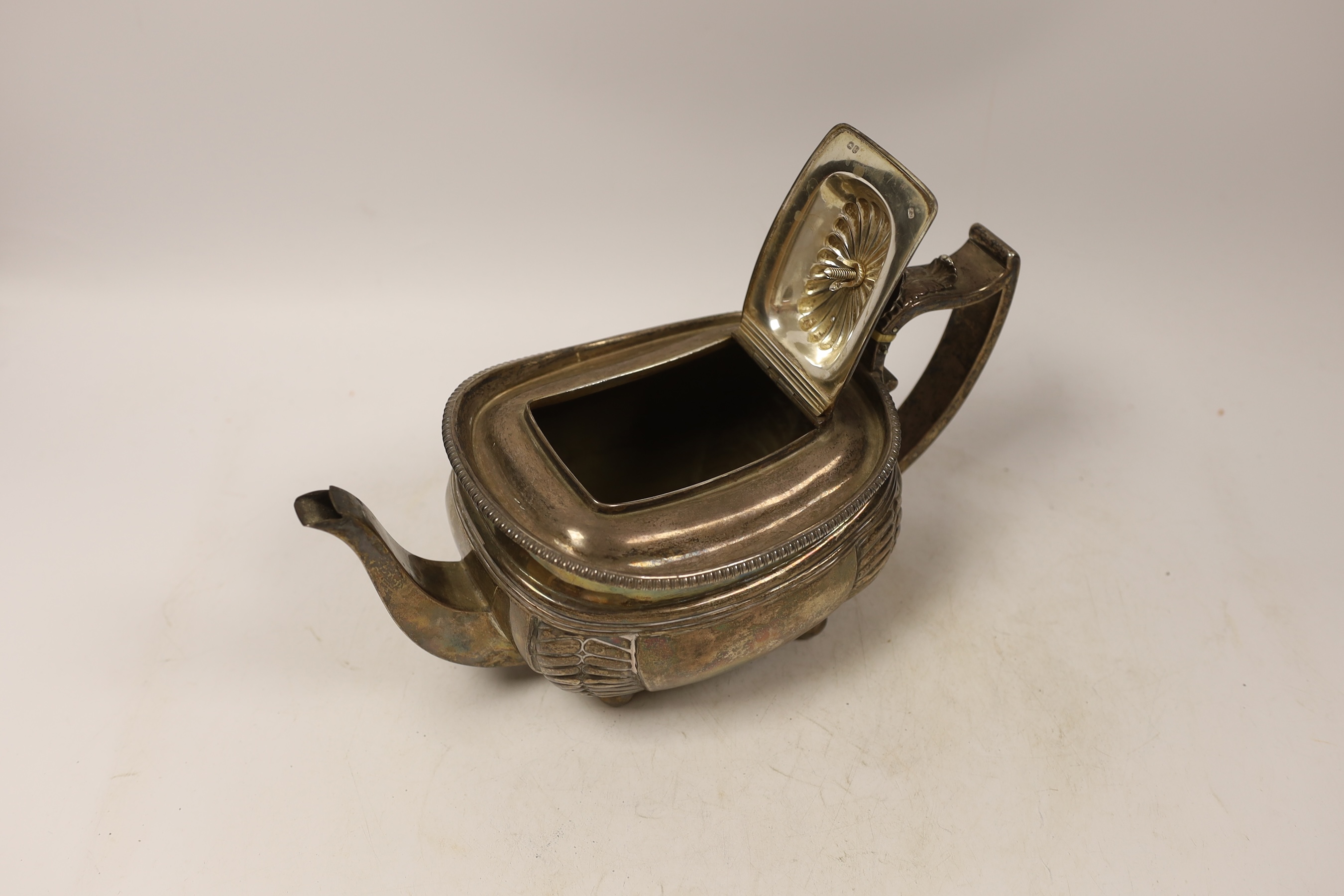 A George III silver shaped oval teapot, Charles Fox, London, 1815, with ivory CITES submission reference 9QAQRA42, gross weight 19.9oz.